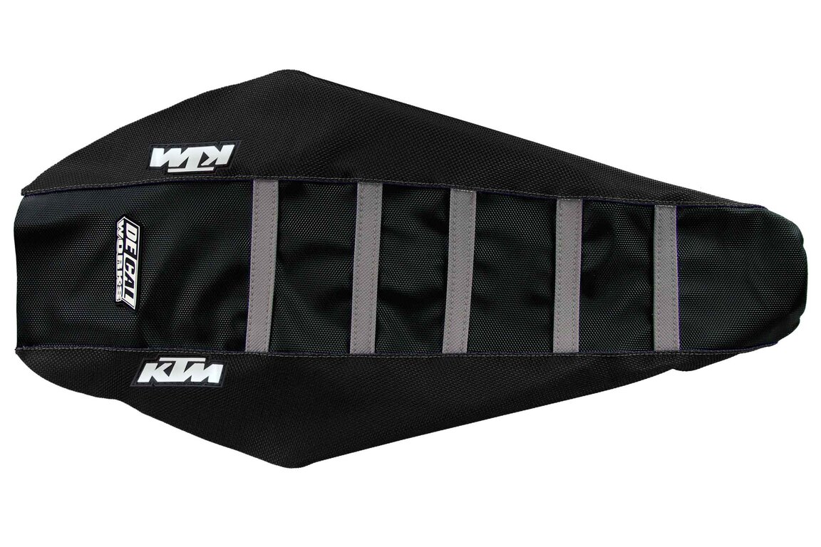 DeCal Works Black Black Grey with KTM logo Gripper Ribbed Seat Covers for KTM: EXC350F (2024-2026), EXC450F (2024-2025), EXC500F (2024-2026), SMR450 (2023-2025), SX125 (2023-2026), SX150 (2025-2026), SX250 (2023-2026), SX300 (2023-2026), SXF250 (2023-2026), SXF250FE (2022-2025), SXF350 (2023-2026), SXF450 (2023-...and more