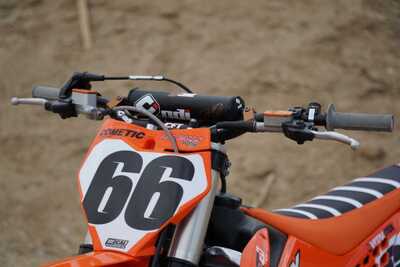 Vital MX KTM SX250 2-Stroke Test Bike #66 Front Plate Decalson White Background and Black Numbers