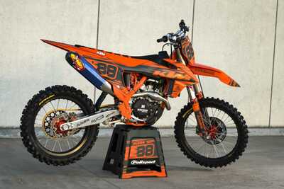 DeCal Works Think It. Create It. 221 Design Dirt Bike Graphics. Solid Orange and Grey Design with Polisport Plastic.