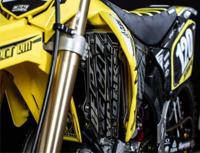 Suzuki RM250 Dirt Bike with Custom Made DeCal Works Graphics Designed by Nic Wright with Radiator Louver Decals