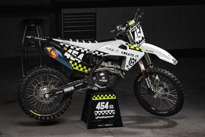 Custom dirt bike graphics with a personal style, black and white checker design with toxic yellow accents, Keefer Logo