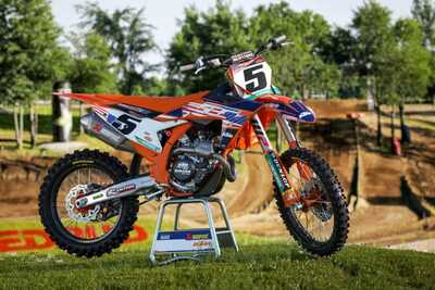 Officially Licensed KTM dirt bike graphics on orange UFO replacement plastic and Kite Hubs #5 Ryan Dungy