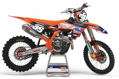 Officially Licensed KTM dirt bike graphics on orange UFO replacement plastic and Dunlop Tires #5 Ryan Dungy