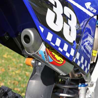 Yamaha YZ blue and white checkers dirt bike graphics on blue UFO plastic with Officially Licensed Wiseco Logos