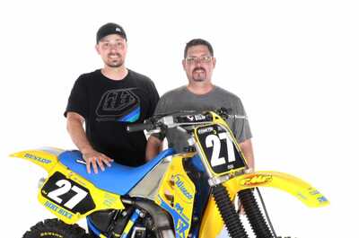 Yellow and blue RM125 Dirt Bike in DeCal Works Project Bike Gallery with custom graphics and Dunlop tires.