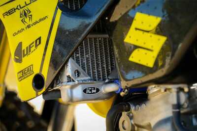 Officially Licensed complete custom graphics with a personal style for a Suzuki RM125 with ODI Bars and Grips