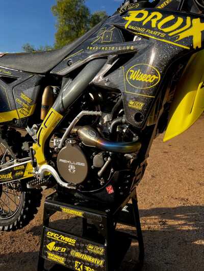 DeCal Works Custom Dirt Bike Decals Black with Yellow Officially Licensed Klotz Oils Logos