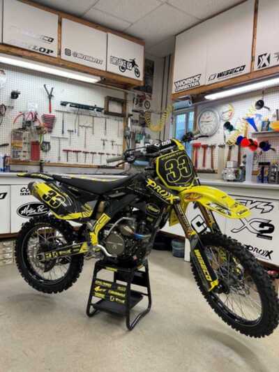 DeCal Works Custom Dirt Bike Decals Black with Yellow Officially Licensed Motoseat Logos