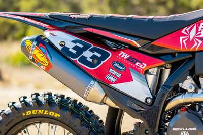 2023 KTM 350 XC-F with red and black dirt bike graphics with Officially Licensed IMS Products Logos