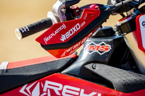 2023 KTM 350 XC-F with red and black dirt bike graphics with Officially Licensed Pro X Parts Logos