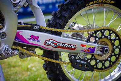 Purple and white throw back yamaha complete dirt bike graphics with custom swingarm decals and Renthal logo