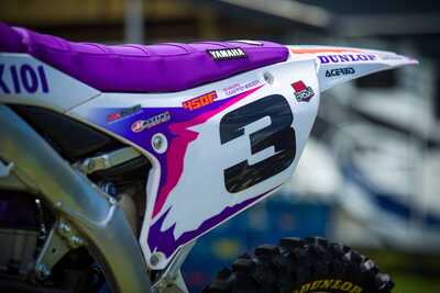 Purple and white throw back yamaha complete dirt bike graphics #3 side plate view and custom purple seat cover