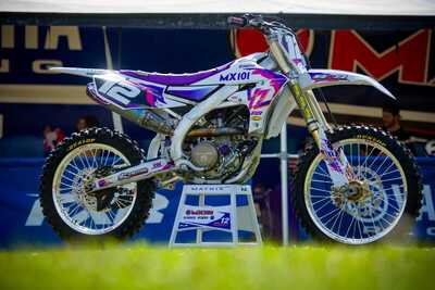 Purple and white throw back yamaha complete dirt bike graphics with #12 Sebastien Racine side view of YZF dirt bike